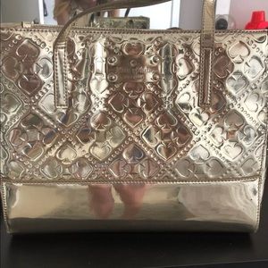 Kate Spade gold purse barely used
